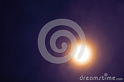 full Beaver Moon on dark cloud on the night sky Stock Photo