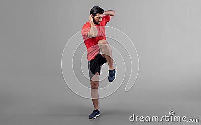 Full body length gaiety shot athletic sporty man with warmup posture Stock Photo