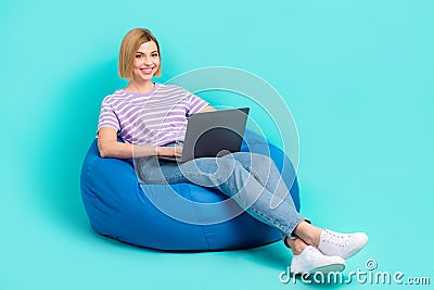 Full body photo cadre of young sitting beanbag girl programmer use netbook chatting with customers isolated on Stock Photo
