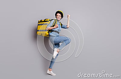 Full body photo crazy ecstatic girl courier deliver all quarantine covid-19 offer raise fists scream carry thermo Stock Photo