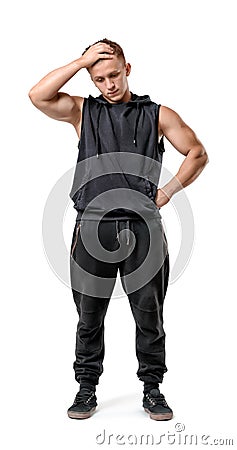 Full body portrait of handsome muscled young man thinking isolated on white background Stock Photo