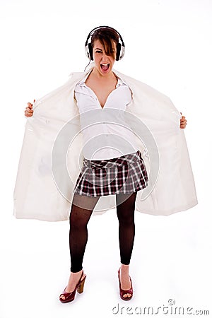 Full body pose of shouting woman wearing overcoat Stock Photo