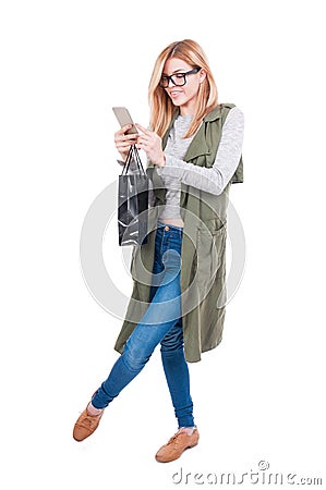 Full body of woman with shopping bag Stock Photo