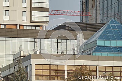 Parts of facades of multi-storey buildings. New buildings. Stock Photo