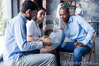 Full concentration at work. Corporate team working colleagues working in modern office. Stock Photo