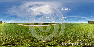 Full 360 degree seamless panorama in equirectangular spherical equidistant projection. Panorama in a field near a road with Stock Photo