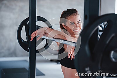 Full of energy. Photo of gorgeous blonde woman in the gym at her weekend time Stock Photo