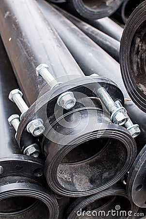Full Frame of black pvc Industrial pipes with aluminum sides Stock Photo
