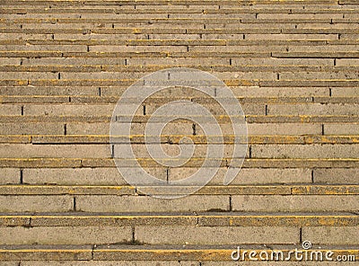 Full frame image of old rough concrete stairs with rows of steps in perspective and traces of yellow paint Stock Photo