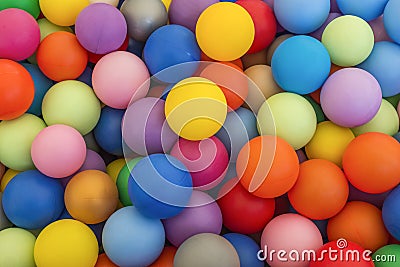 Full frame of multicolored plastic balls in the ball pit ball crawl. Lots of colorful balls for children to play Stock Photo