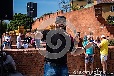 Full Gospel Church Christian Community evangelists dancing and singing in Warsaw, Poland - May 28, 2023 Editorial Stock Photo
