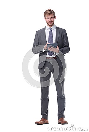 In full growth. businessman reading the entries in the organizer. Stock Photo