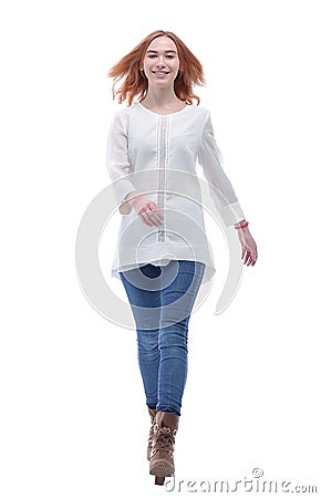 In full growth. confident young woman striding forward. Stock Photo