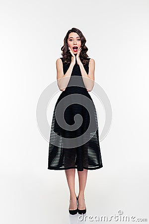 Full length of amazed woman with makeup in retro style Stock Photo