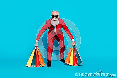 Full length body size photo aged man cheerful walking on sale in center isolated vivid blue color background Stock Photo