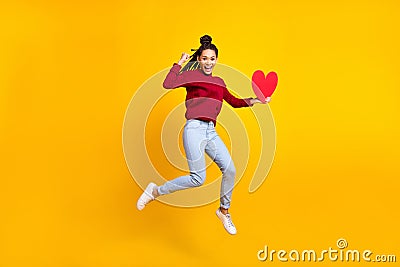 Full length body size photo woman showing red heart jumping isolated vibrant blue color background Stock Photo