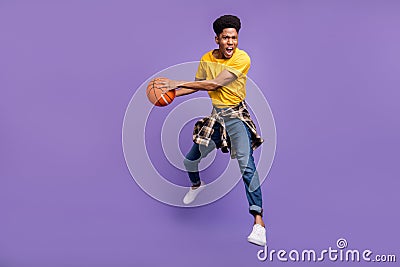 Full length body size view of attractive energetic motivated guy jumping playing game isolated over violet purple color Stock Photo