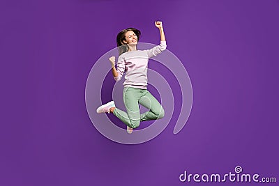 Full length body size view of her she nice lovely slim fit cheerful cheery girl jumping celebrating attainment having Stock Photo