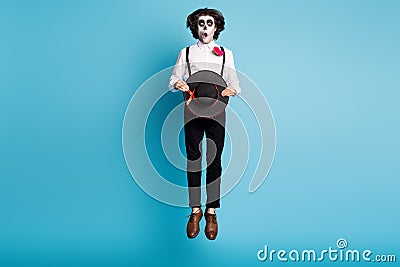 Full length body size view of his he handsome skinny tall creepy scary spooky amazed stunned gentleman jumping up Stock Photo