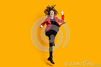 Full length body size view of nice successful lucky cheerful wavy-haired girl jumping rejoicing isolated over bright Stock Photo