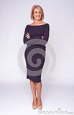 Full length of a fashionable old woman Stock Photo