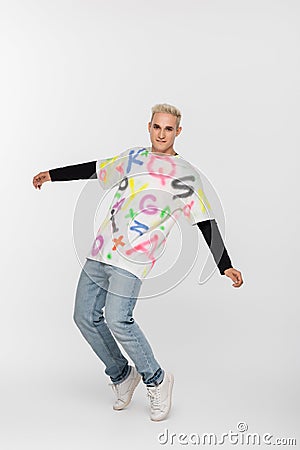 full length of gay in alphabet Stock Photo