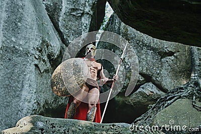 Spartan warrior in the woods Stock Photo