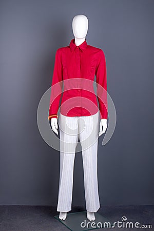 Full length mannequin in red women shirt. Stock Photo