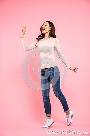 Full length photo of attractive woman 20s with long brown hair w Stock Photo