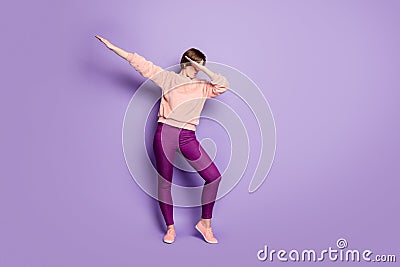 Full length photo of funky lady dancing strange modern moves disco party students hide eyes palm raise hands wear casual Stock Photo