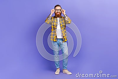 Full length photo of positive optimistic man wear trendy outfit hand touch eyewear nice quality glasses purple Stock Photo