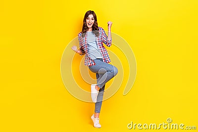Full length photo of young attractive woman fists up hooray positive mood finally done her driving test success isolated Stock Photo