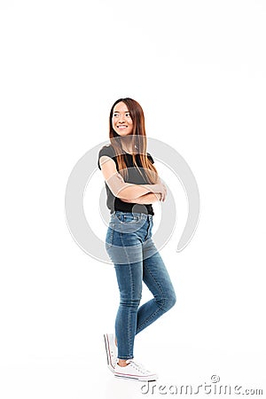 Full length photo of young pretty chinese woman in black tshirt Stock Photo