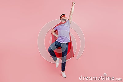 Full length photo of young superman strong power safety confident over pink color background Stock Photo