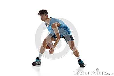 Full length portrait of basketball player practicing isolated on white studio background. Tall muscular athlete Stock Photo