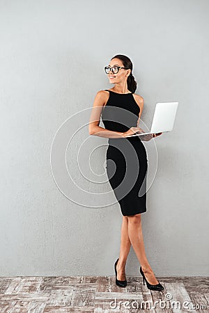 Full length portrait of a beautiful happy businesswoman Stock Photo