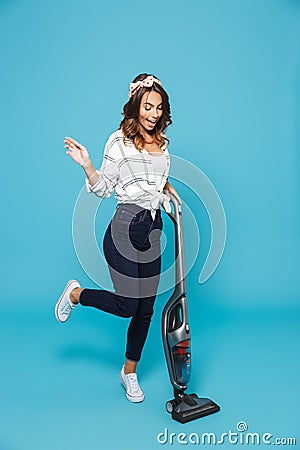 Full length portrait of european housewife 20s housekeeping and Stock Photo