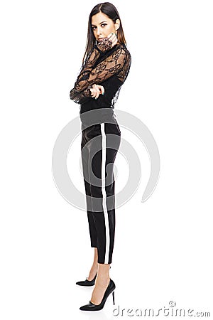 Full length portrait of a glamour fashion style woman on white background. Stock Photo