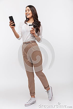 Full length portrait of a smiling asian businesswoman Stock Photo