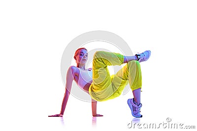 Full length portrait of young girl do Glute Stretches for tailbone stung with bridge pose and cross legs in fashion Stock Photo