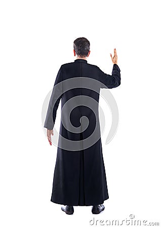 Full length priest blessing arm rear view Stock Photo