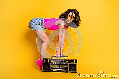 Full length profile photo of funny gorgeous flirty lady party summer chill posing bend hold vintage boom box wear sun Stock Photo