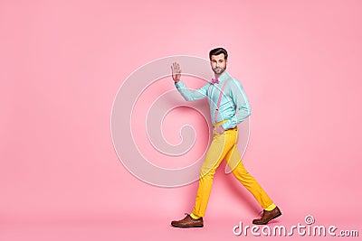 Full length profile photo of handsome guy trend look walk meeting red carpet celebrity waving hand wear shirt suspenders Stock Photo