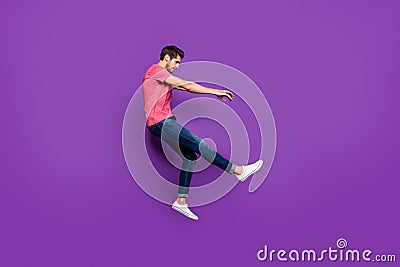 Full length profile side photo of minded guy jump wind blow he fall fly lose gravity weightlessness wear good look Stock Photo