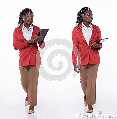 Full length 20s young African American Woman Business salesman, walking forward left right step Stock Photo