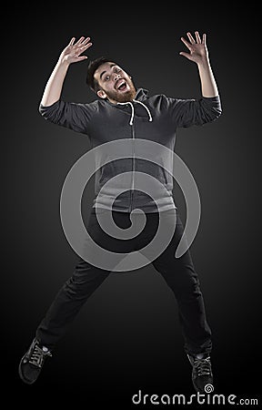 Full Length Shot of Young Man in Wacky Pose Stock Photo