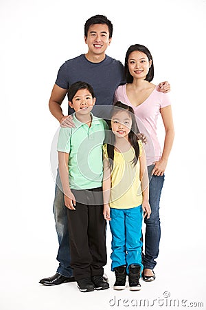 Full Length Studio Shot Of Chinese Family Stock Photo