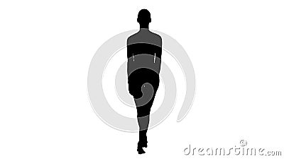 Silhouette Young woman walking in white sports clothes barefoot and smiling widely. Stock Photo