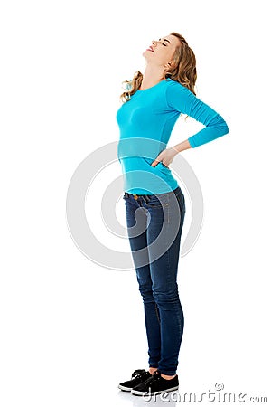 Full length woman with back pain Stock Photo