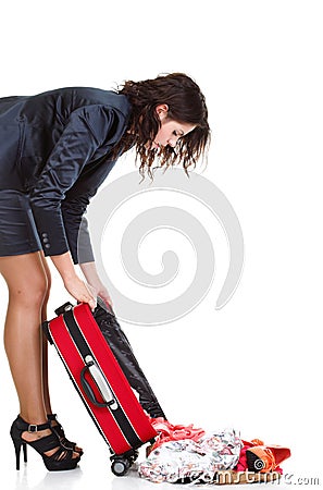 Full length young business woman to late red travel bagd Stock Photo